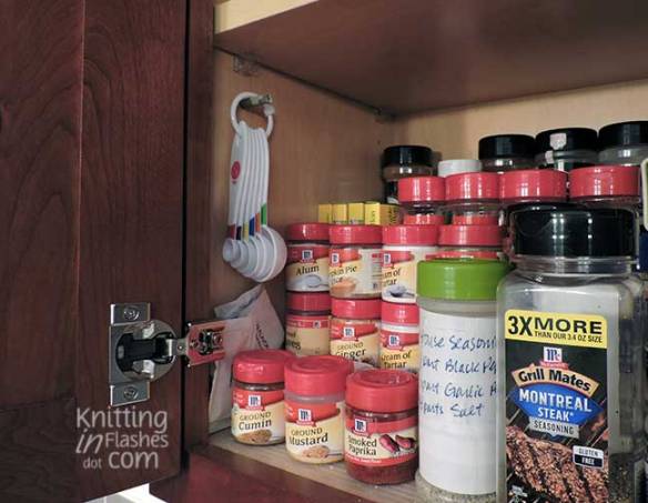 kitchen cabinet with spoons